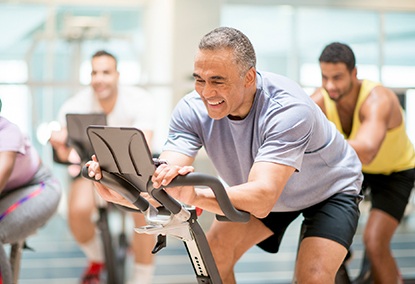 Man in spin class thanks to increased energy after sleep apnea treatment